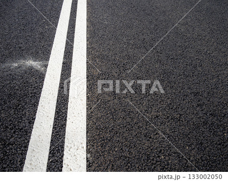 double solid line on new asphalt of city highway double solid line on new asphalt of city highway 133002050