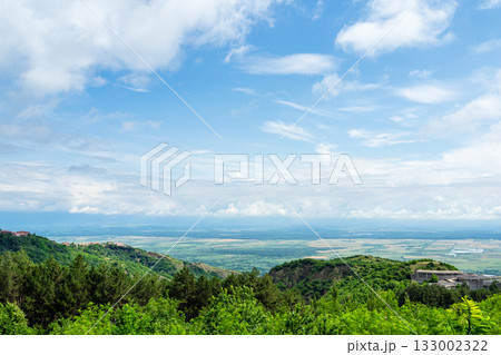 white clouds in blue sky over Alazani valley white clouds in blue sky over Alazani valley 133002322