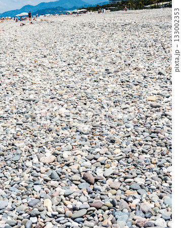 surface of pebble beach in Batumi on sunny day 133002353