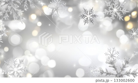 Silver background with sparkling snowflakes and soft bokeh lights for festive celebrations 133002600