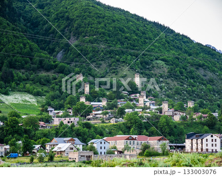 view of Mestia town on mountain slope in evening 133003076