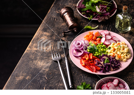 Balanced healthy bowl with vegetables and salmon Balanced healthy bowl with vegetables and salmon 133005081