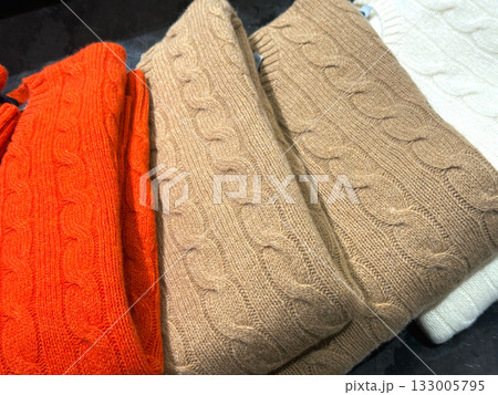 Designer sweater in boutique setting Designer sweater in boutique setting 133005795