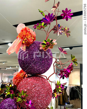 Elegant spring composition with bird and shiny balls 133005798