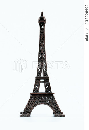 Small Eiffel Tower model showcases intricate design. High quality photo Small Eiffel Tower model showcases intricate design. High quality photo 133006400