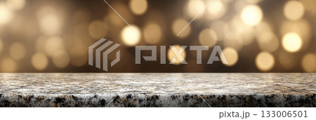 Brown marble surface with soft champagne bokeh light background in warm tones 133006501