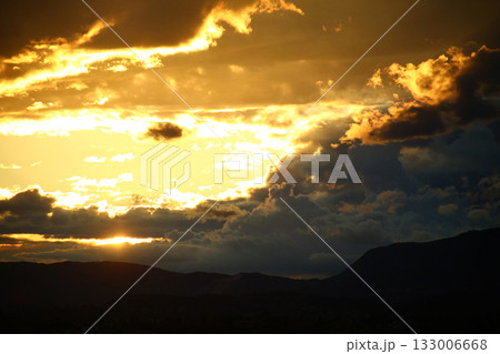 Dramatic cloudy sky with soft light tones Dramatic cloudy sky with soft light tones 133006668