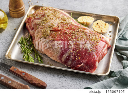 fresh raw pork neck meat with garlic and spices 133007105