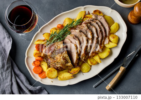 freshly baked sliced pork neck roast 133007110
