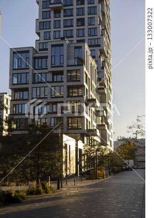 A modern residential complex. Sunset view. Contemporary architecture. 133007322