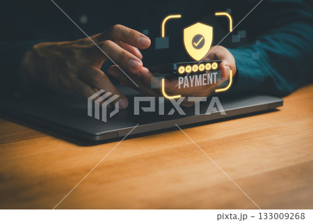 Person using smartphone for secure online payment with shield, check mark and password protection symbol, representing mobile banking, fintech security, digital transaction and safe e-commerce. 133009268