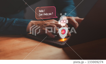 Artificial intelligence chatbot assistant on laptop computer with virtual robot icon and text bubble, representing AI technology, online customer support, automation and digital communication service. Artificial intelligence chatbot assistant on laptop computer with virtual robot icon and text bubble, representing AI technology, online customer support, automation and digital communication service. 133009274