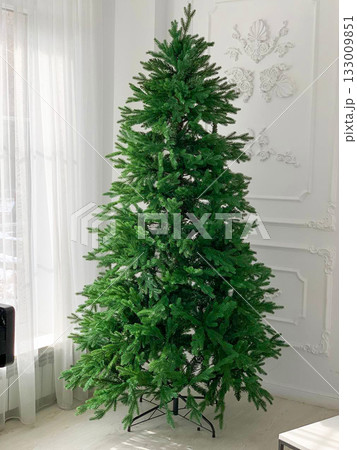 Christmas tree decorated with toys 133009851