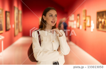 Girl view pictures and icons in museum hall Girl view pictures and icons in museum hall 133013050