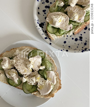 Golden, crispy toast topped with butter and jam, perfect for breakfast or snack-related projects. This image captures the warmth and comfort of a simple yet satisfying meal. 133013148