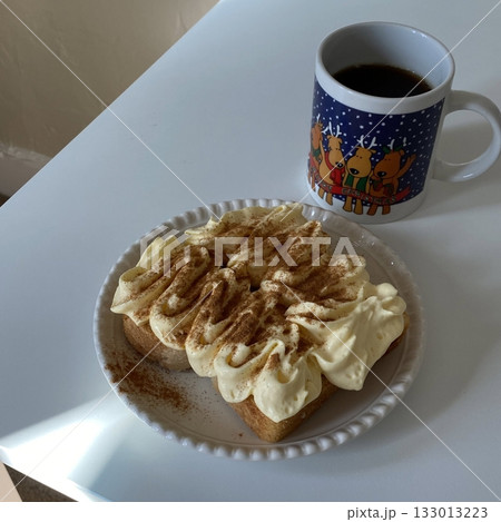 Golden, fluffy French toast with a crisp edge and soft center, topped with syrup, fruits, or powdered sugar—offering a perfect balance of sweetness, warmth, and comfort in every delightful bite. 133013223