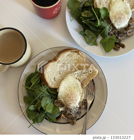 Golden, fluffy French toast with a crisp edge and soft center, topped with syrup, fruits, or powdered sugar—offering a perfect balance of sweetness, warmth, and comfort in every delightful bite. 133013227