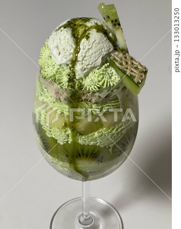 Layered matcha parfait with rich green tea cream, sweet red beans, mochi, and crunchy toppings—offering a perfect balance of earthy bitterness and sweet textures in every delightful spoonful. Layered matcha parfait with rich green tea cream, sweet red beans, mochi, and crunchy toppings—offering a perfect balance of earthy bitterness and sweet textures in every delightful spoonful. 133013250