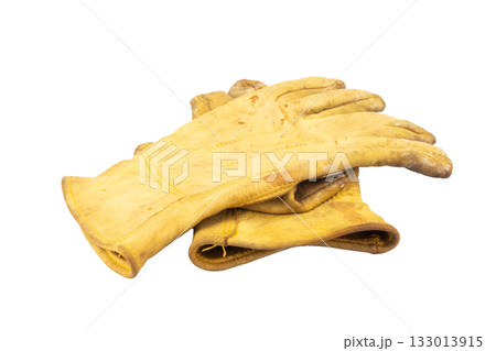 Yellow work gloves Dirty Old isolated on white background Yellow work gloves Dirty Old isolated on white background 133013915