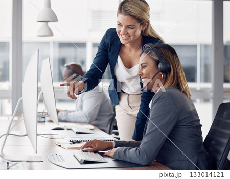 Call center woman, computer and coaching for learning, reading and customer support with happiness at job. Indian telemarketing consultant, mentor and crm training with pointing at monitor at table Call center woman, computer and coaching for learning, reading and customer support with happiness at job. Indian telemarketing consultant, mentor and crm training with pointing at monitor at table 133014121