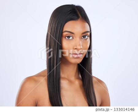 Woman, hair and beauty and haircare with cosmetic care and keratin treatment in portrait on studio background. Serious, Indian female with straight hairstyle and skin glow, Brazilian and cosmetics 133014146