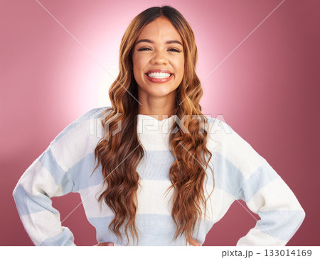 Happy, woman and portrait in a studio with makeup, casual fashion and excited smile. Isolated, pink background and cosmetics glow of a gen z, young and female model with happiness while smiling Happy, woman and portrait in a studio with makeup, casual fashion and excited smile. Isolated, pink background and cosmetics glow of a gen z, young and female model with happiness while smiling 133014169