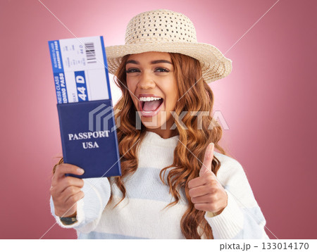 Portrait, thumbs up and woman with USA passport, thumbs up and ready for travel with smile on a pink studio background. Face, female tourist and traveler with gesture for agreement, documents and joy Portrait, thumbs up and woman with USA passport, thumbs up and ready for travel with smile on a pink studio background. Face, female tourist and traveler with gesture for agreement, documents and joy 133014170