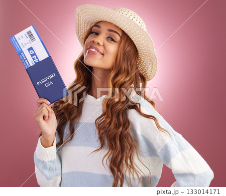 Travel, passport and plane ticket, woman in portrait with smile and freedom on pink background. American female, carefree and happiness, traveling documents and vacation, ready for journey in studio Travel, passport and plane ticket, woman in portrait with smile and freedom on pink background. American female, carefree and happiness, traveling documents and vacation, ready for journey in studio 133014171
