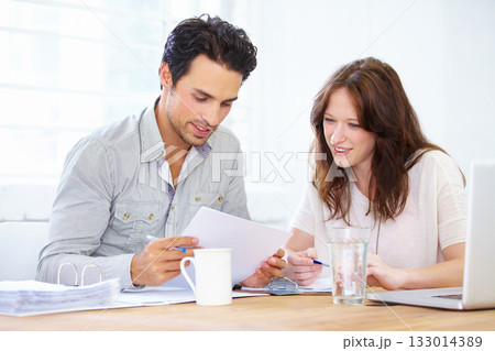 Documents, planning and business people or partner in meeting collaboration, teamwork or financial review. Startup man and woman with paperwork talking, feedback or advice on finance, taxes or profit Documents, planning and business people or partner in meeting collaboration, teamwork or financial review. Startup man and woman with paperwork talking, feedback or advice on finance, taxes or profit 133014389