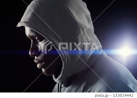 Fitness, night and face of black man with focus in city for workout, exercise and marathon training. Sports, strong and profile of male athlete with dedication, motivation and serious for running 133014442