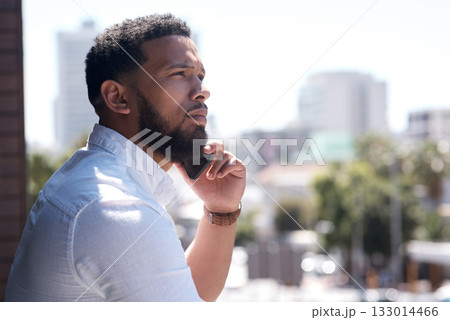 Serious, black businessman and call on a cellphone in a city or standing outside talking or office overlooking on bokeh. Communication, face and corporate professional on mobile or conversation 133014466