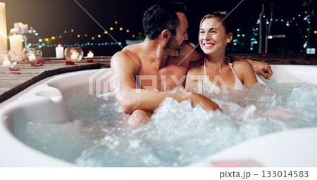 Love, relax and couple in a hot tub, night and holiday for a break, bonding and happiness. Partners, mature man and woman in a pool, vacation and loving together with fun, relationship and marriage 133014583