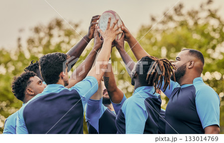 Diversity, team and men hands together in sports for support, motivation or goals outdoors. Sport group holding rugby ball in fitness, teamwork or success for match preparation or game Diversity, team and men hands together in sports for support, motivation or goals outdoors. Sport group holding rugby ball in fitness, teamwork or success for match preparation or game 133014769