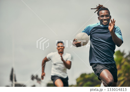 Rugby, energy and black man with ball running to score goal on field at game, match or practice workout. Sports, fitness and motion, player in action and blur on grass with action and skill in sport. Rugby, energy and black man with ball running to score goal on field at game, match or practice workout. Sports, fitness and motion, player in action and blur on grass with action and skill in sport. 133014813