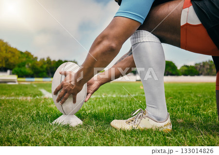 Rugby, hands and man ready with ball to score goal on field at game, match or practice workout. Sports, fitness and professional player on grass, motivation, energy and skill in team sport challenge. 133014826