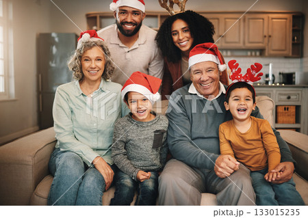 Christmas, big family and portrait smile on sofa in living room in home, bonding and care. Xmas, laughing and happy grandmother, grandfather and parents with boys or children enjoying holiday time. 133015235