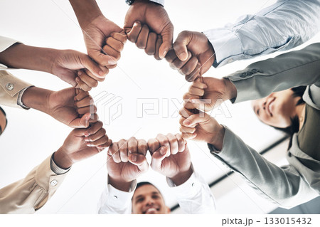 Team building, circle or business people hands in fist for motivation in office meeting together. Diversity, low angle or happy employees with mission, strategy or group support for project planning Team building, circle or business people hands in fist for motivation in office meeting together. Diversity, low angle or happy employees with mission, strategy or group support for project planning 133015432