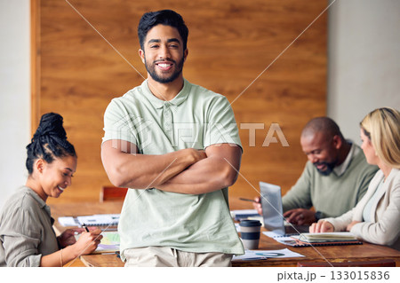 Portrait, business and man with arms crossed, success or professional with staff, planning or new project. Face, male leader or entrepreneur with smile, leadership skills or teamwork for advertising Portrait, business and man with arms crossed, success or professional with staff, planning or new project. Face, male leader or entrepreneur with smile, leadership skills or teamwork for advertising 133015836