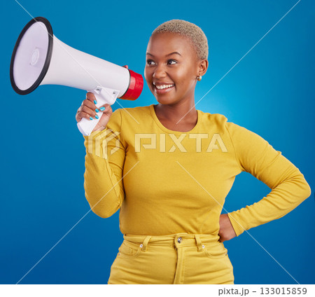 Black woman, megaphone and smile, protest and voice, freedom of speech and activism on blue background. Happy female, broadcast and speak out, rally and activist, loudspeaker with opinion in studio Black woman, megaphone and smile, protest and voice, freedom of speech and activism on blue background. Happy female, broadcast and speak out, rally and activist, loudspeaker with opinion in studio 133015859