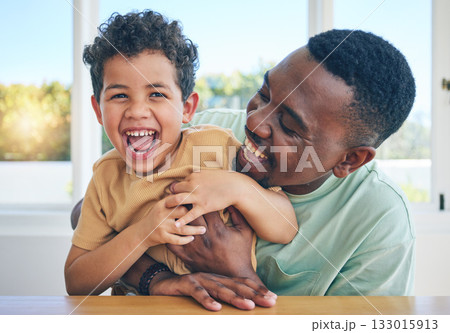Father, laugh and black man tickle son, have fun and enjoy happy quality time together in Jamaica home. Family bonding, child love and playing African people, youth kid or papa tickling laughing boy 133015913