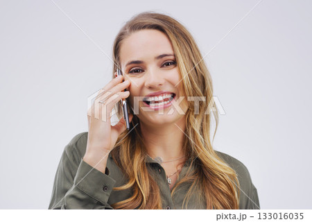 Smile, phone call and portrait of woman talking in studio isolated on a white background. Happy, cellphone and face of female person speaking, discussion or communication, conversation and networking 133016035