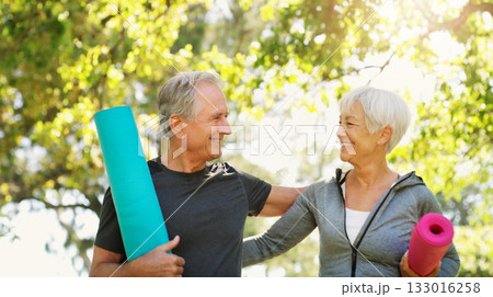 Old couple outdoor, yoga and fitness and hug in park, zen with spiritual healing and happiness. Marriage, retirement and people bonding with smile and exercise mat, nature and health with wellness Old couple outdoor, yoga and fitness and hug in park, zen with spiritual healing and happiness. Marriage, retirement and people bonding with smile and exercise mat, nature and health with wellness 133016258