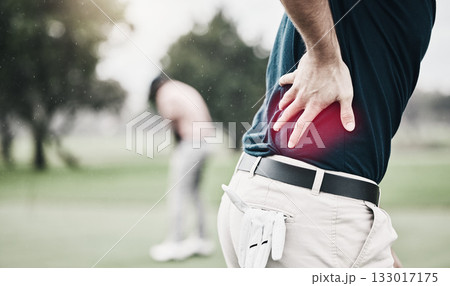 Sports, injury and golf, man with back pain during game on course, massage and relief in health and wellness. Green, hands on spine in support and golfer with body ache during outdoor golfing workout 133017175