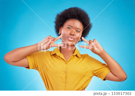 Happy, motivation and black woman with peace sign, inspiration and success against blue studio background. African American female, lady and hand gesture for emoji, silly and v symbol with happiness Happy, motivation and black woman with peace sign, inspiration and success against blue studio background. African American female, lady and hand gesture for emoji, silly and v symbol with happiness 133017302