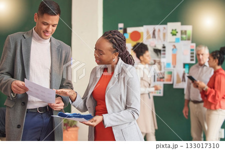 Teamwork, designers or people fashion meeting for planning clothing, choice or boutique clothes together. Creative employees talking, speaking or working on ideas, sketch paper or strategy in office 133017310