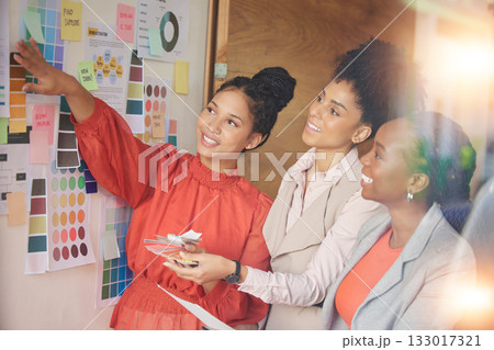 Teamwork, board or fashion meeting for planning clothing, new colors or boutique clothes in collaboration together. Happy, women or creative designers speaking or working on group ideas or strategy 133017321