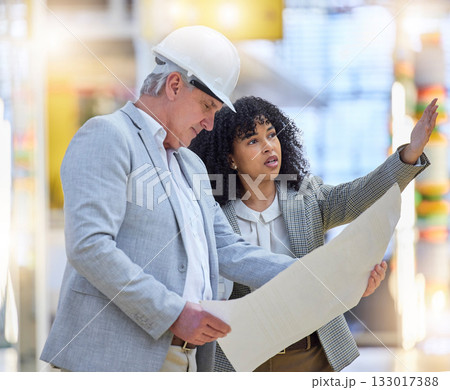 Man, woman and construction team pointing at building site, blueprint ideas and discussion of design. Diversity, project management and architecture for infrastructure, engineering and floor planning Man, woman and construction team pointing at building site, blueprint ideas and discussion of design. Diversity, project management and architecture for infrastructure, engineering and floor planning 133017388