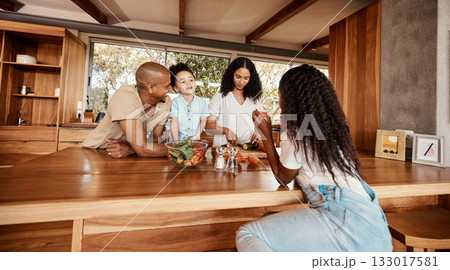 Family, breakfast table and cooking with fruit, bonding and children for health, care or love together. Woman, kids or man for healthy, natural and organic nutrition for diet, food or meal in home Family, breakfast table and cooking with fruit, bonding and children for health, care or love together. Woman, kids or man for healthy, natural and organic nutrition for diet, food or meal in home 133017581