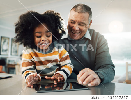 Tablet, online education and child with grandfather bonding, fun internet games and e learning development. Biracial, elderly man with kid on digital technology app for family support and teaching 133017837