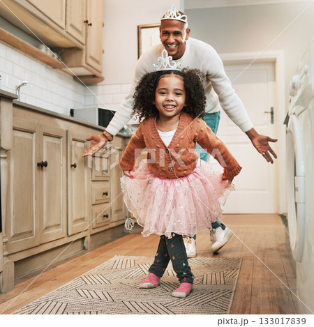 Child, parent ballet dance and portrait of a girl and father together bonding with dancing in the kitchen. Home, kid and dad with love and care in a house playing a dancer game for children fun Child, parent ballet dance and portrait of a girl and father together bonding with dancing in the kitchen. Home, kid and dad with love and care in a house playing a dancer game for children fun 133017839